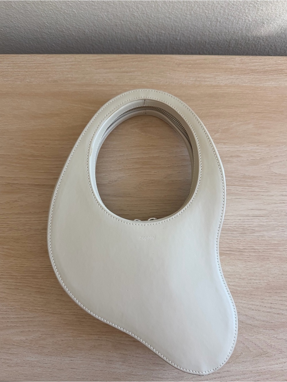 Coperni off-white Melted Swipe Bag